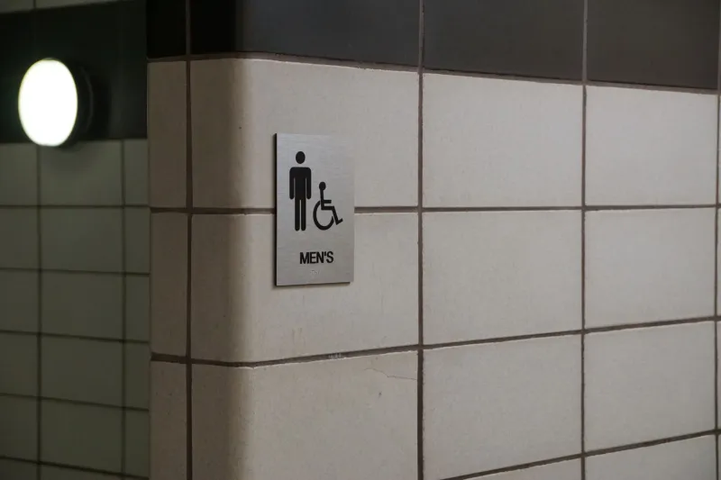 The Door Says 'Occupied.' The Confrontation Says Otherwise: A Field Guide to Restroom Politics With an Invisible Disability